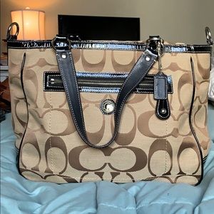 Coach monogrammed tan and black purse